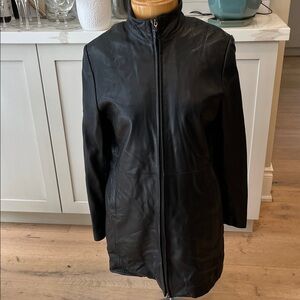 Danier Black Leather Coat with side pockets & zip in quilted warm lining